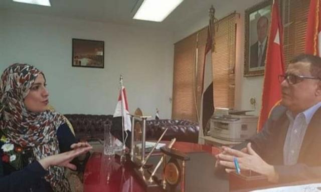 الكاتبة الصحفية سها البغدادي والملحق العسكري اليمني 