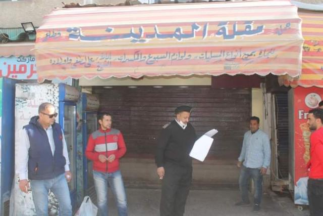 غلق وتشميع 14محل مخالف