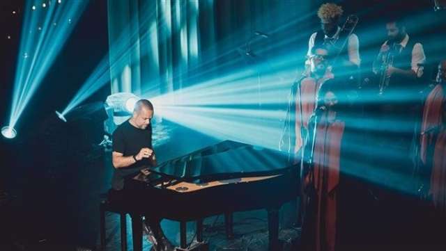 O By Michel Fadel