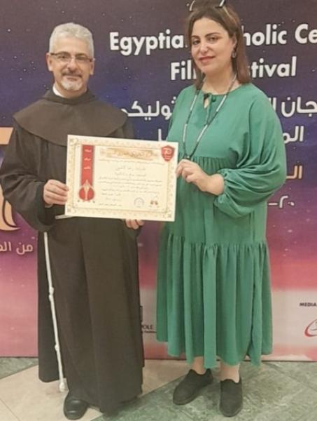 رشا لاشين والاب بطرس دنيال