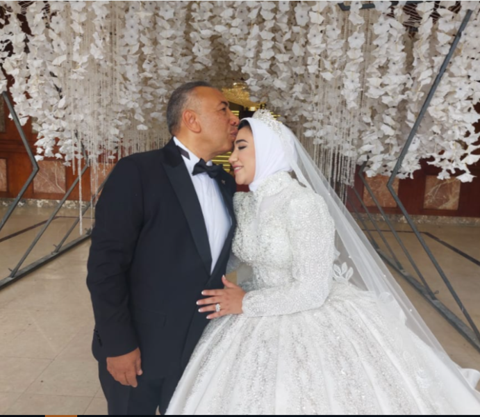 العروسان  روان  و الاستاذ  احمد  فتحي  اسماعيل