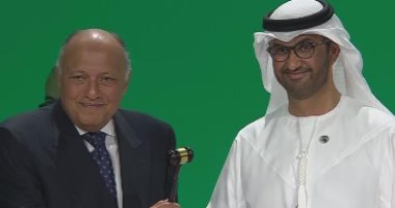 وزير الخارجية اثناء تسليم الدورة 28 من مؤتمر الاطراف