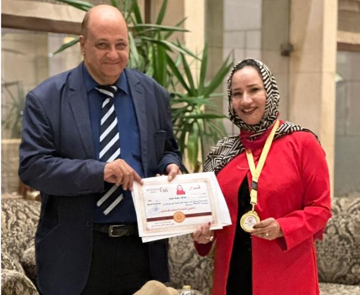 الأستاذة عواطف حفوظه قويعه ود .معتز صلاح الدين