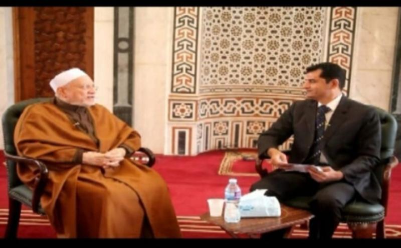 فضيلة الدكتور احمد عمر هاشم مع الاعلامى محمود