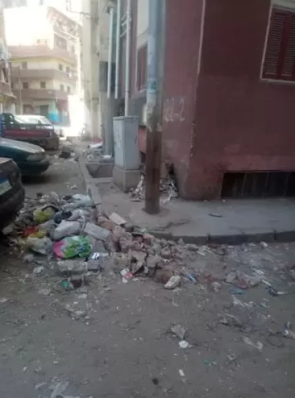 القمامه بجوار المساكن حي السادات