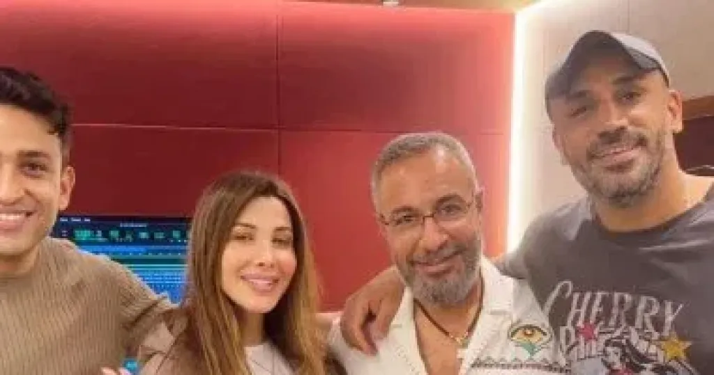 نانسى عجرم والملحن محمد يحيى والشاعر تامر حسين و الموزع طارق مدكور