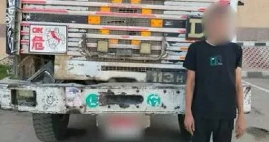 السائق المتهم عقب القبض عليه