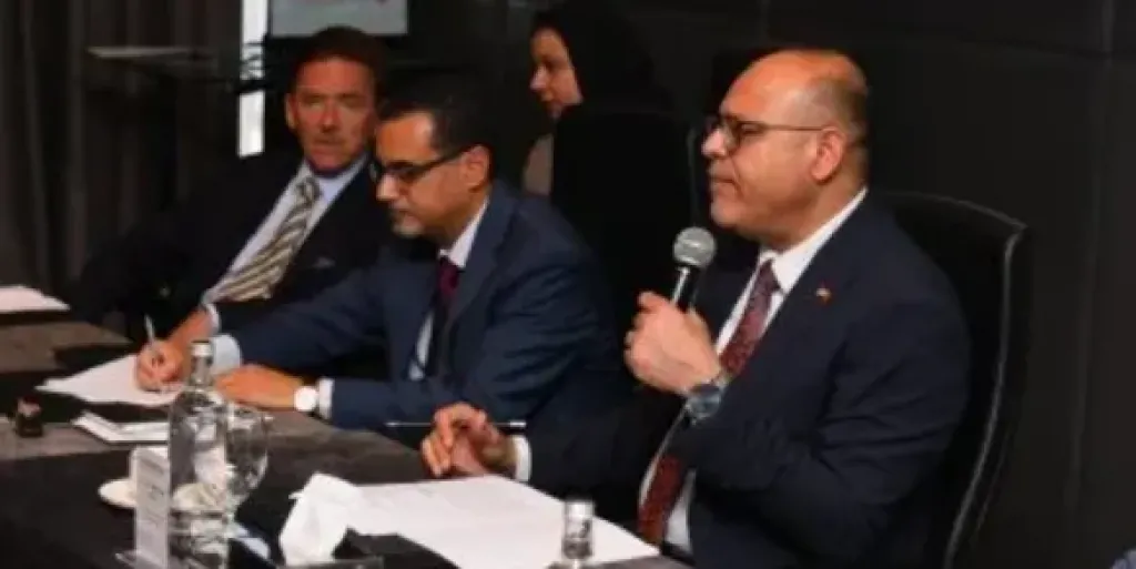 وزير العمل محمد جبران خلال مشاركته بالندوة