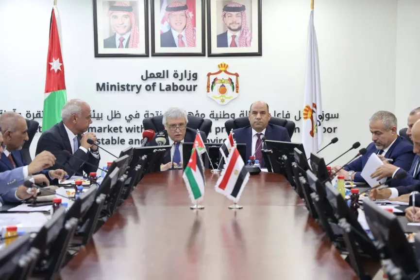 وزير العمل مع نظيره الأردني